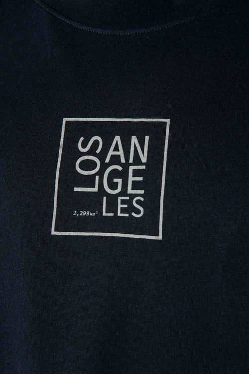 Card slide image -  CAMISETA DE MOVIES NEGRA ESTAMPADA EN ESPALDA PARA HOMBRE